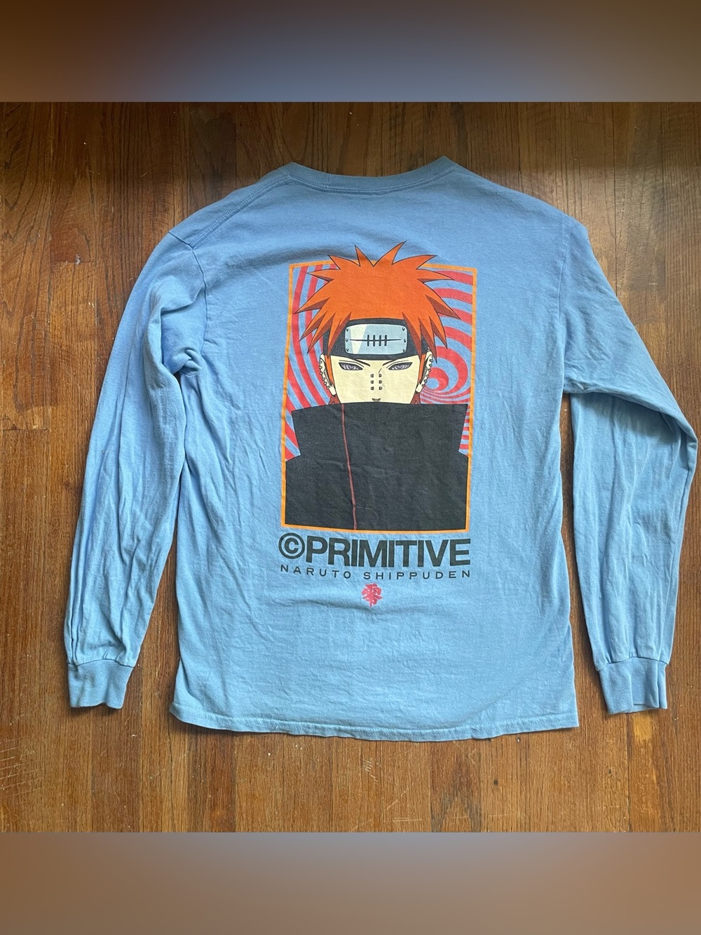 Primitive Light Blue Naruto Shippuden Long Sleeve Tee with Orange Graphic